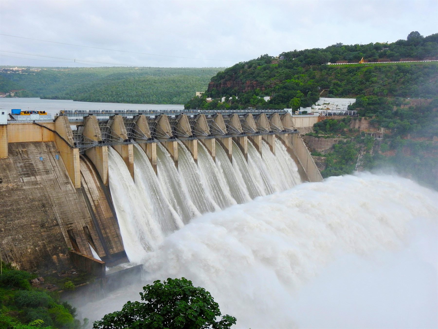 Water discharging through the gates of a dam spillway